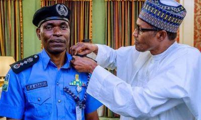 Buhari Decorates New IGP Abubakar Adamu