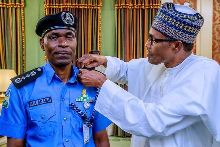 Buhari Decorates New IGP Abubakar Adamu